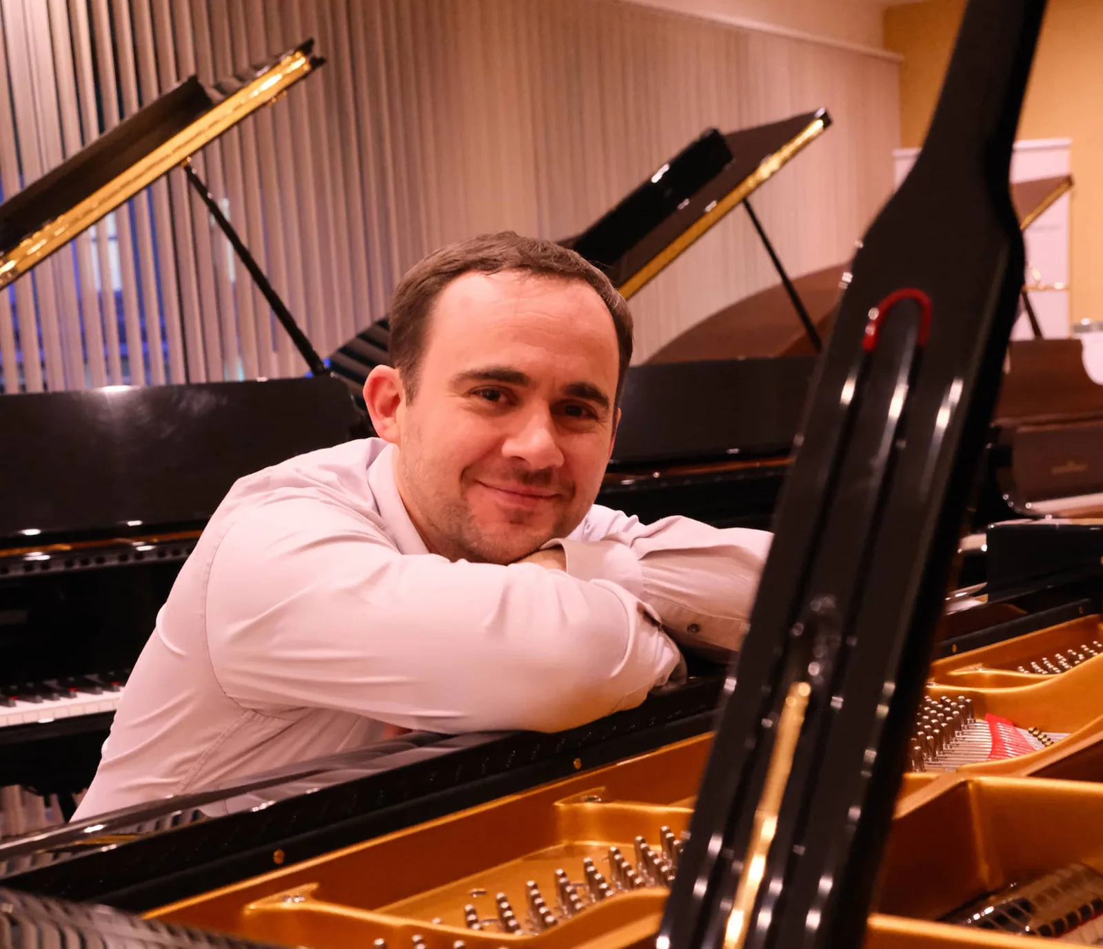 Musician sitting at the piano